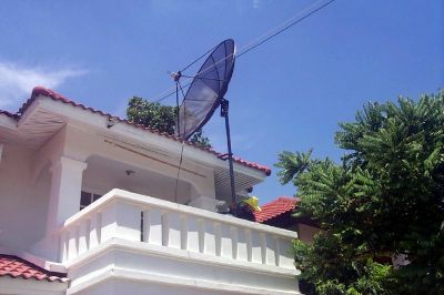 setting up the satellite dish in the south of Bangkok